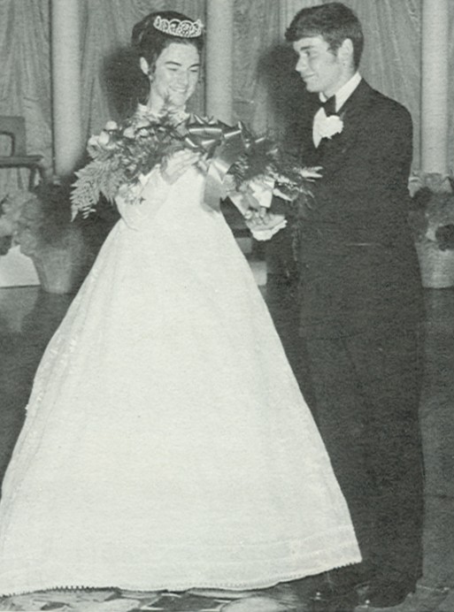Queen Michele Clarkson escorted  by Jim Hastings 